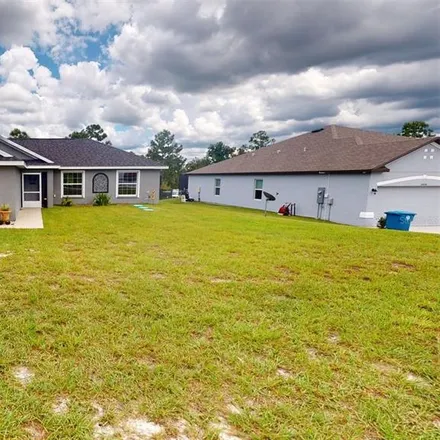 Buy this 3 bed house on 6434 Grapewood Road in Spring Hill, FL 34609