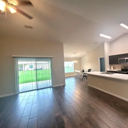 Rent this 4 bed house on 1637 Southwest California Boulevard in Port Saint Lucie, FL 34953