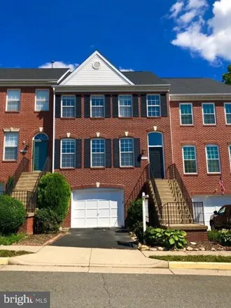Rent this 3 bed townhouse on 8898 Modano Place in Merrifield, VA 22031