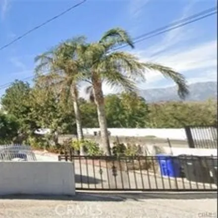 Buy this 4 bed house on 8387 Palms Avenue in San Bernardino County, CA 92335