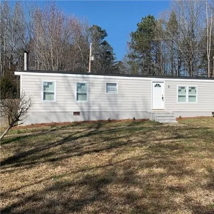 Rent this 4 bed house on 5220 Lee Massey Road in Mineral Springs, NC 28173