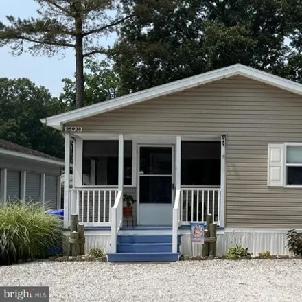 Buy this studio apartment on 25924 Atlas Street in Long Neck, Sussex County