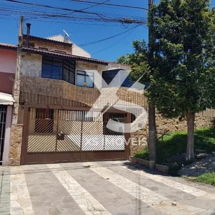 Buy this 4 bed house on Rua Henrique Correia 1213 in Bairro Alto, Curitiba - PR