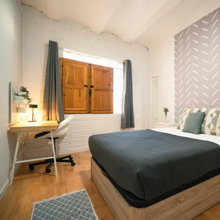 Rent this 4 bed room on Hotel Gaudí in Carrer de les Penedides, 08001 Barcelona
