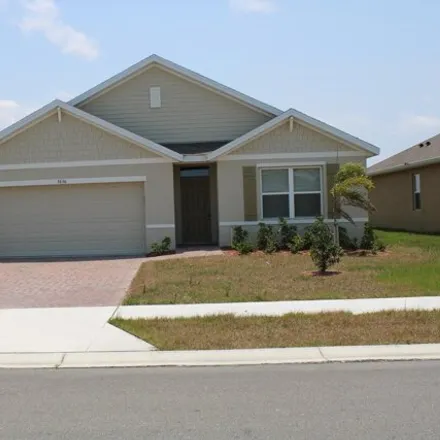 Rent this 4 bed house on Aberdeen Drive in Palm Bay, FL
