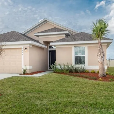 Buy this 4 bed house on Kylar Drive Northwest in Palm Bay, FL