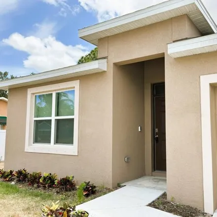 Rent this 4 bed house on 670 Northwest Tremont Avenue in Port Saint Lucie, FL 34983