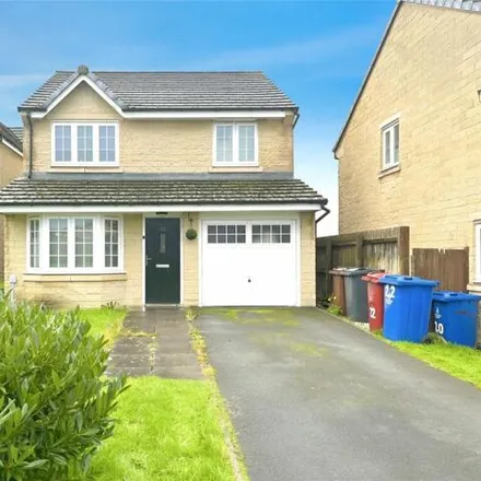 Rent this 4 bed house on Coulthurst Gardens in Darwen, BB3 3FB