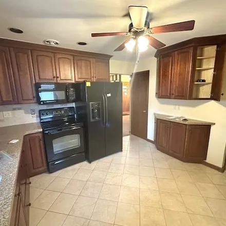 Rent this 3 bed apartment on 205 Warren Avenue in Rockford, IL 61107