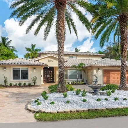Rent this 5 bed house on 689 Hibiscus Drive in Golden Isles, Hallandale Beach