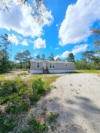 Buy this studio apartment on 12099 Ehrenwald Drive in Hernando County, FL 34613