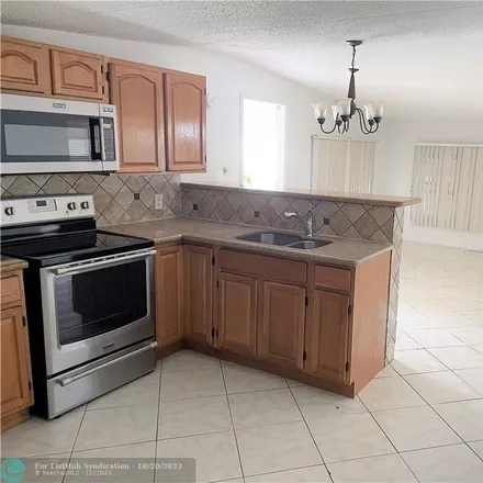 Image 3 - 8580 Southwest 23rd Place, Davie, FL 33324, USA - House for rent