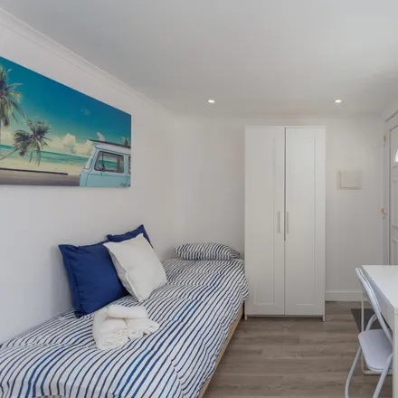 Image 1 - Kuta Beach House, Rua Bulhão Pato, 2825-394 Costa da Caparica, Portugal - Apartment for rent