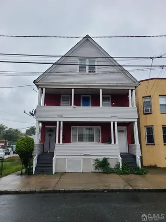 Buy this studio duplex on 209 Sherman Street in Perth Amboy, NJ 08861