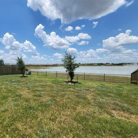 Rent this 3 bed house on 1439 Paradise Found Drive in Brazoria County, TX 77583