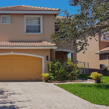 Buy this 4 bed house on 7119 Crescent Creek Way in Coconut Creek, FL 33073