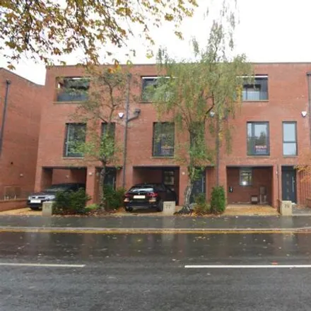 Rent this 3 bed townhouse on 72 Burton Road in Manchester, M20 1HG