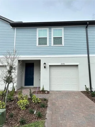 Rent this 3 bed house on Crape Jasmine Lane in Meadow Woods, FL 32824