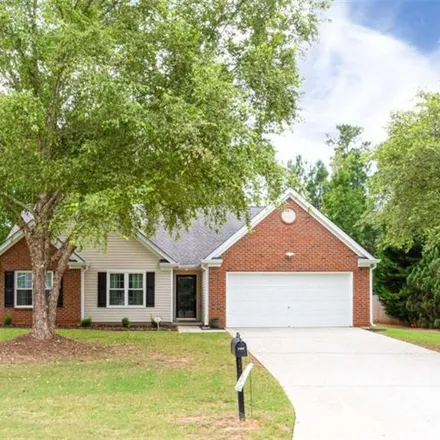Buy this 3 bed house on 1355 Tullifenney Court Southwest in Gwinnett County, GA 30017