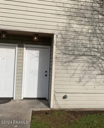 Buy this 2 bed townhouse on 299 High Meadows Boulevard in Lafayette, LA 70507