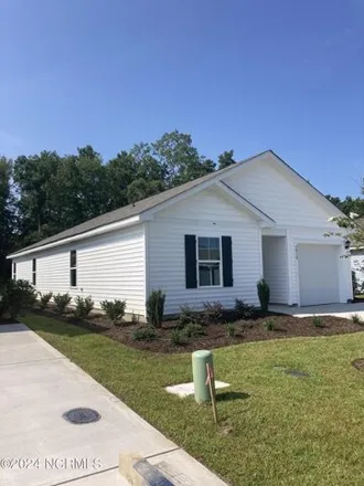 Rent this 4 bed house on 1030 Course Ln in Surf City, North Carolina