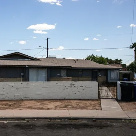 Buy this studio house on 1061 North July Circle in Mesa, AZ 85203