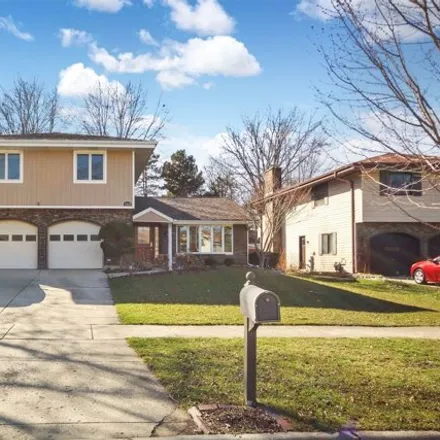 Buy this 4 bed house on 160 Cambridge Lane in Bloomingdale, IL 60108