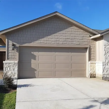Rent this 3 bed house on 9863 Grosbeak Ln in Magnolia, Texas