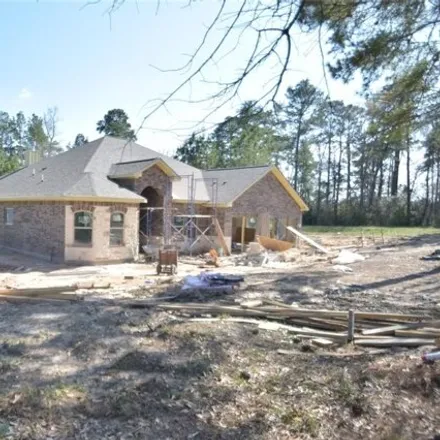 Buy this 4 bed house on Timberwilde Drive in Walker County, TX 77340