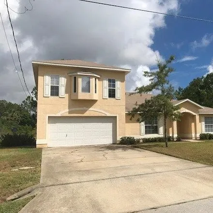 Buy this 5 bed house on 5 Pittson Lane in Palm Coast, FL 32164