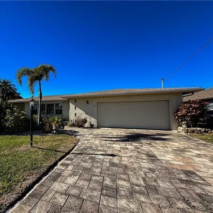 Buy this 4 bed house on 2387 Southeast 27th Street in Cape Coral, FL 33904