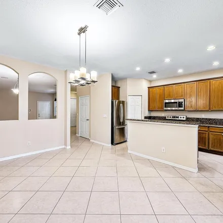 Rent this 3 bed apartment on Bonsai Circle in Palm Beach Gardens, FL 33418