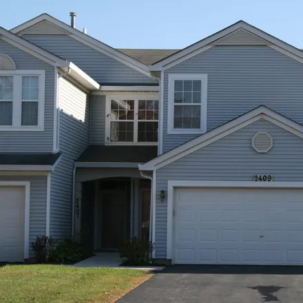 Buy this 3 bed townhouse on 2409 Reflections Drive in Aurora, IL 60502