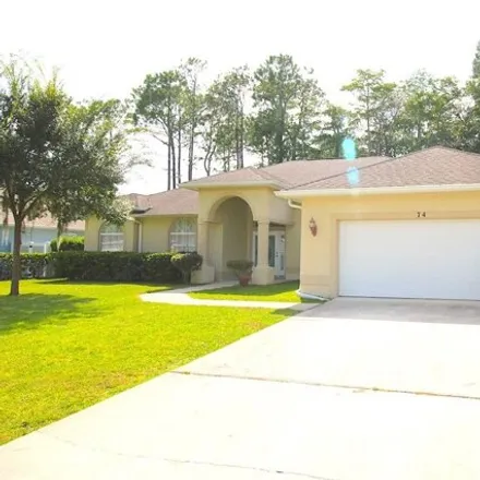 Buy this 4 bed house on 74 Edward Drive in Palm Coast, FL 32164