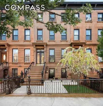 Buy this 5 bed townhouse on 424 Macon Street in New York, NY 11233