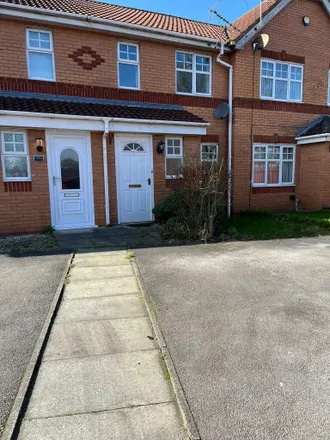 Rent this 2 bed townhouse on Croftwood Grove in Knowsley, L35 3UT