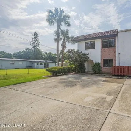 Buy this 3 bed townhouse on 1984 Magnolia Avenue in South Daytona, FL 32119