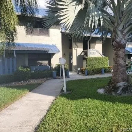 Rent this 2 bed condo on Northeast 14th Court in Jensen Beach, FL 34957