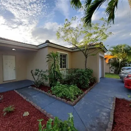 Rent this 3 bed house on New Renaissance Middle School in 10701 Southwest 25th Street, Miramar