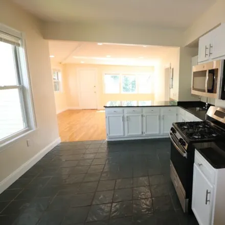 Rent this 4 bed apartment on 2572 Massachusetts Ave
