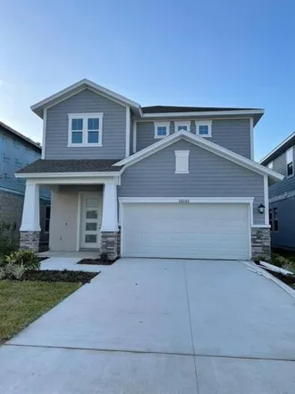 Rent this 4 bed house on Cozy Creek Drive in Pasco County, FL 33544