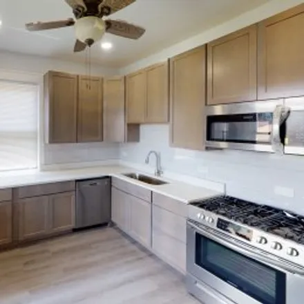 Buy this 4 bed apartment on 7539 South Champlain Avenue in Greater Grand Crossing, Chicago