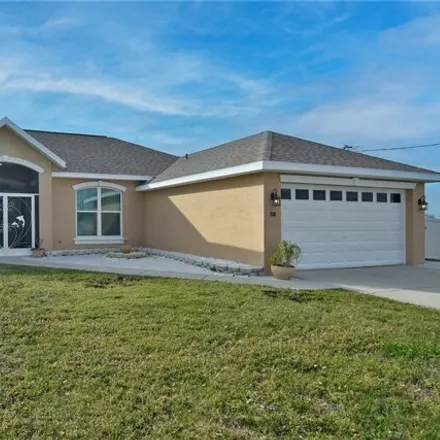 Rent this 3 bed house on 114 31st Avenue in Cape Coral, FL 33991