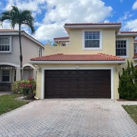 Buy this 3 bed house on 3943 Crescent Creek Drive in Coconut Creek, FL 33073