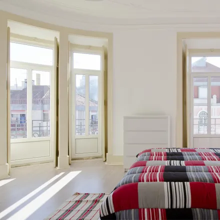 Rent this 7 bed room on Rua Morais Soares 114 in 1170-179 Lisbon, Portugal