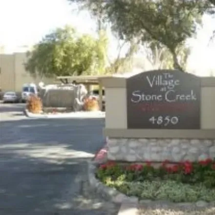 Rent this 1 bed condo on 4850 E Desert Cove Ave