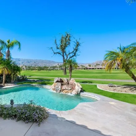 Rent this 3 bed house on Tom Weiskopf Private Course (PGA West) in Golf View Drive, La Quinta