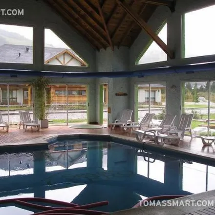 Buy this 3 bed apartment on Avenida Carlos Bustos in Departamento Bariloche, 8400 San Carlos de Bariloche