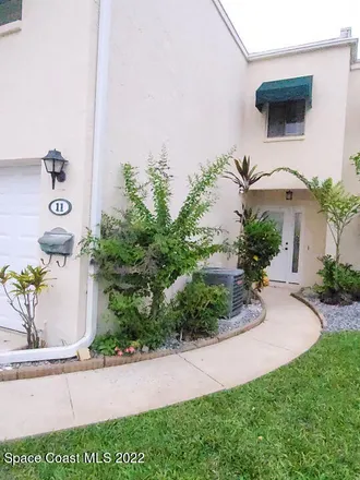Buy this 3 bed townhouse on 11 Emerald Court in Satellite Beach, FL 32937