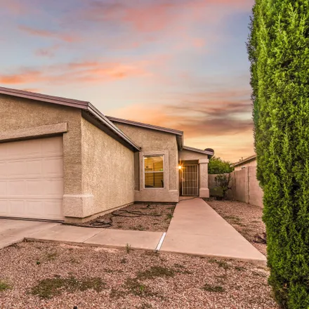 Buy this 3 bed house on 3860 East Painted Tortoise Street in Tucson, AZ 85706